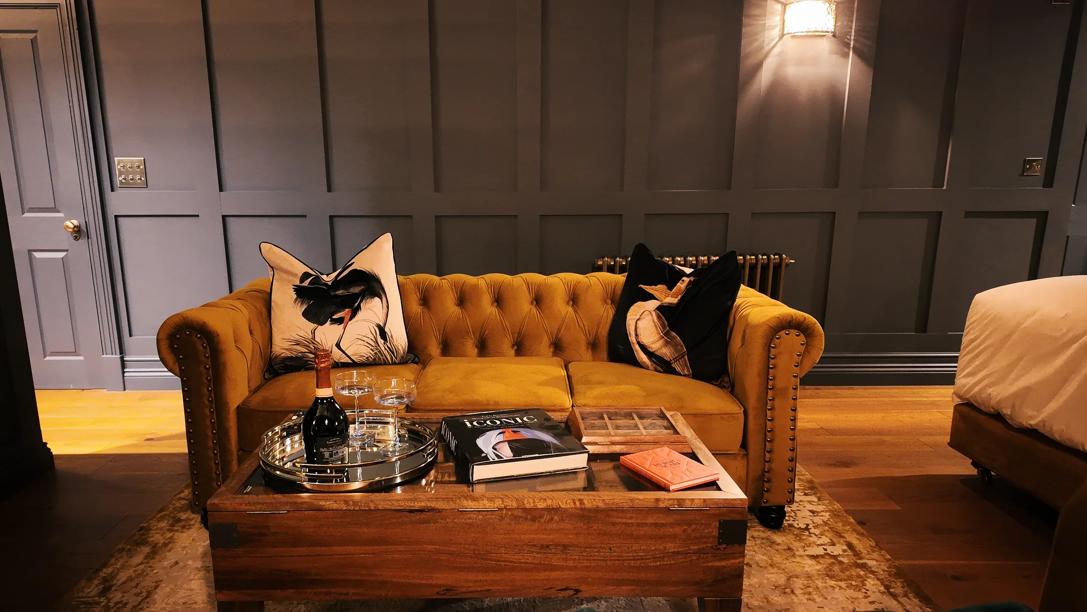 Gold sofa in the Hangover Suite